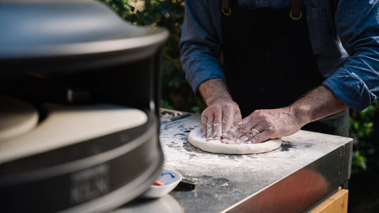 How do I cook pizza in the KILN?